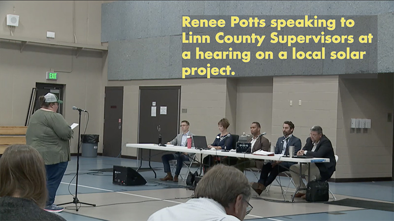 Renee Potts speaking in front of the solar commission
